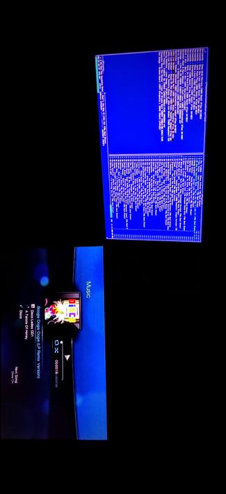 The photograph shot in total darkness is divided into two sections. The top section shows an IPS LED panel blue  with white text in mocp music on console player, with various lines of text and numbers, data from FLAC musical masterpieces. The bottom section displays a music player interface on a device, showing the song "Boogie Oogie Oogie (LP Remix Version)" by Disco Tastes Ledes CD1, with a colorful album cover and a progress bar indicating 00:00:18 of 00:07:32. The word "Music" is visible on the right side of the screen.

 Ovis2-8B

🌱 Energy used: 0.158 Wh