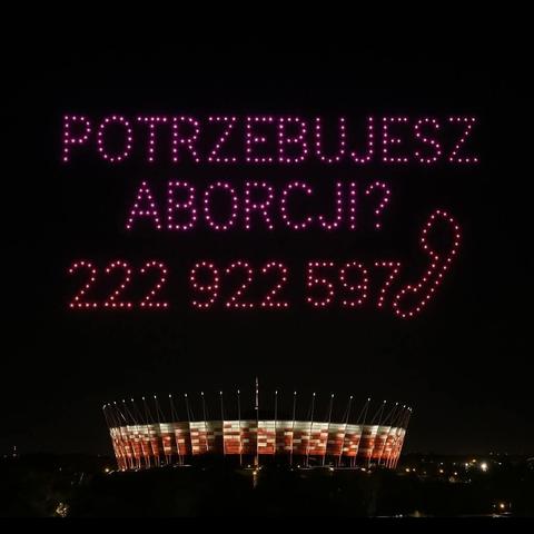 napis stylizowany na iluminację nad stadionem narodowym

potrzebujesz aborcji? 
222 922 597 [ikonka telefonu]