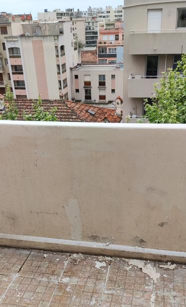 Part of the wall plastered, cracked covered and moldy cement cleaned up before painting it.