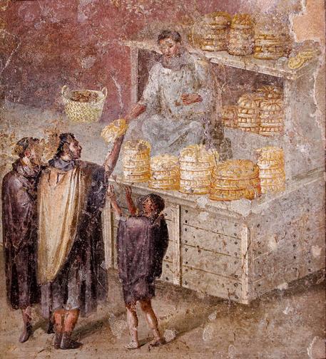Description from The World History Encyclopaedia: “The so-called "Sale of Bread" fresco from the House of the Baker or Casa del Forno (c. 79 CE) in Pompeii, Italy. The fresco is misleadingly titled because it actually depicts the distribution of bread by a political candidate or politician, rather than the sale of bread by a baker or vendor.”