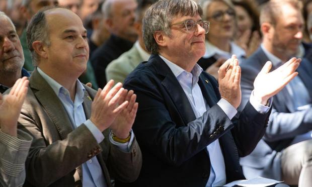 Jordi Turull y Carles Puigdemont (Europa Press via Getty Images)