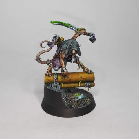 Skaven assassin on a sewer pipe doing the Blade pose.