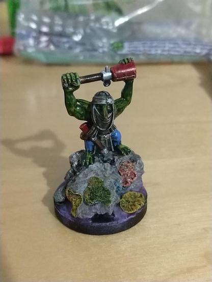 Helmeted goblin with a stikk bomb overhead. Someone's rolling a critical success soon!