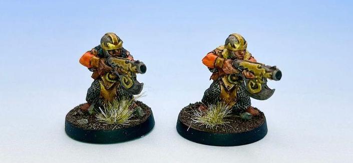 Two dwarfs with axe blunderbusses.