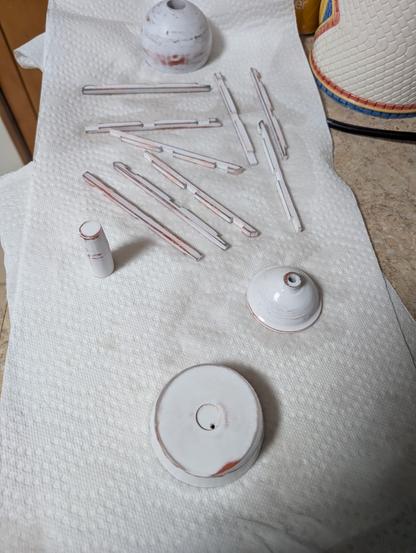 13 3d printed parts drying on paper towels