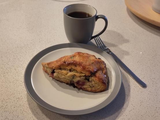 The scone as eaten the next day — by itself with black coffee, in the American style.