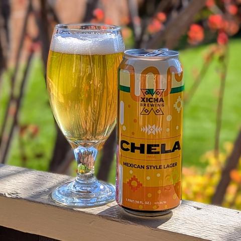 A glass and can of Chela Mexican Style Lager from Xicha Brewing of Salem, Oregon