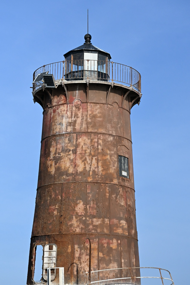 A closer view of the dilapidated and rusted Bloody Point lighthouse