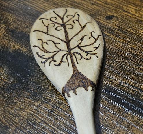 My first attempt at burning the tree of Gondor onto a wooden spoon.