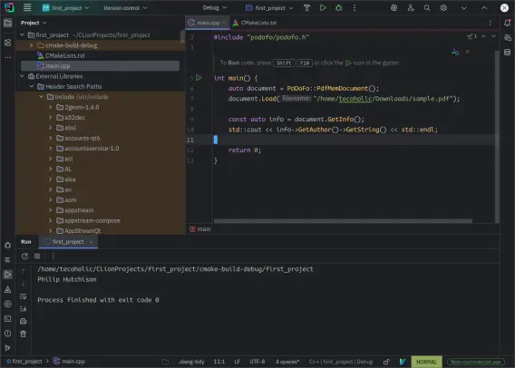 Screenshot of CLion IDE showing a simple code file using the PoDoFo C++ Library to read a sample PDF file and print it's author's name.