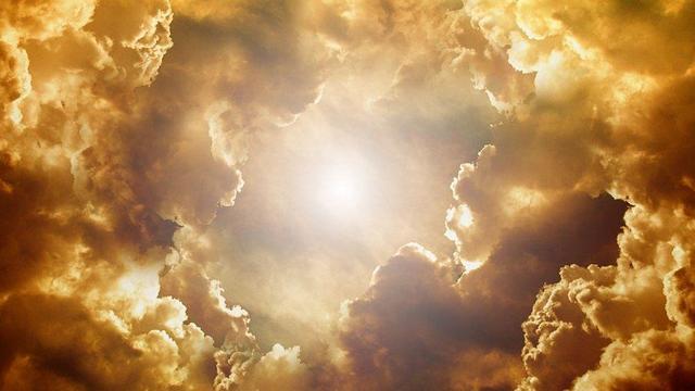 Sun shining through clouds.