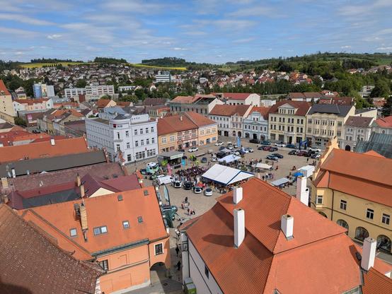 A picture of an old town square from above, sunny weather.
