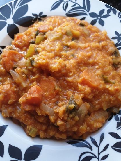 A bowl of Red Lentil, Roasted Carrots and fresh Wild Garlic soup