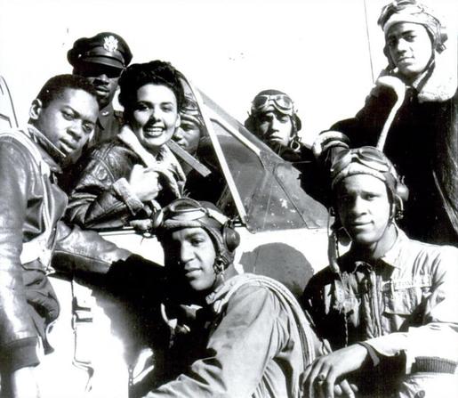Actress Lena Horne hanging with members of the Tuskegee Airmen at their Alabama base in 1945.