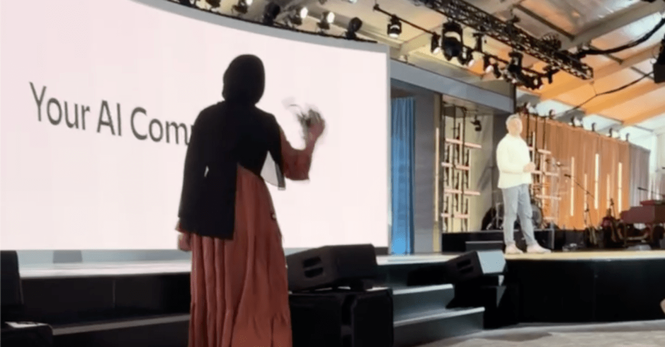 A protestor disrupts a Microsoft event.