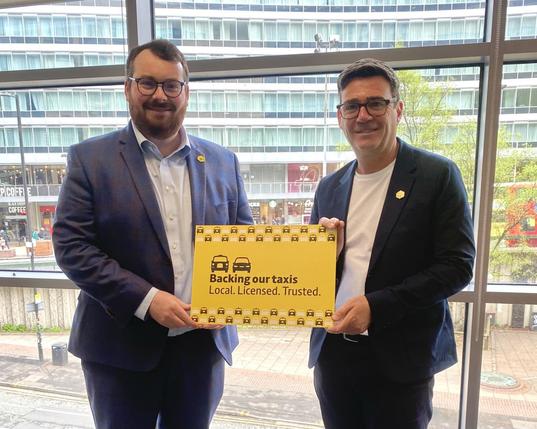 GM Mayor Andy Burnham with Cllr Eamonn O'Brien launching a new campaign called Backing our taxis: Local. Licensed. Trusted.