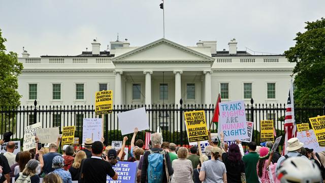 Demostrators rally during the nationwide "Hands Off!" protest against US President Donald Trump's policies and executive actions, near the White House in Washington, DC, on April 19, 2025. The group behind the April 19 demonstration, known as 50501  short for "50 protests, 50 states, one day"  is the same organization that led the global "Hands Off" protests on April 5. Demonstrations are expected to spread throughout the United States, reaching international cities as well. (Photo by Richard PIERRIN / AFP) (Photo by RICHARD PIERRIN/AFP via Getty Images)