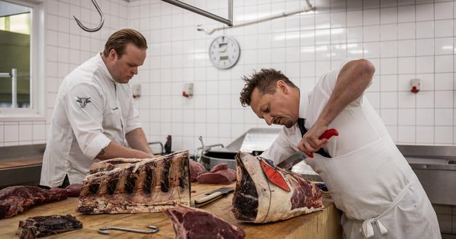 Hendrik Dierendonck, right, and one of his chefs, Timon Michiels, at work at his butchery and restaurant in Saint-Idesbald, Belgium, last month.