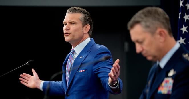 Defense Secretary Pete Hegseth at a news conference at the Pentagon on Thursday with Gen. Dan Caine, the chairman of the Joint Chiefs of Staff.