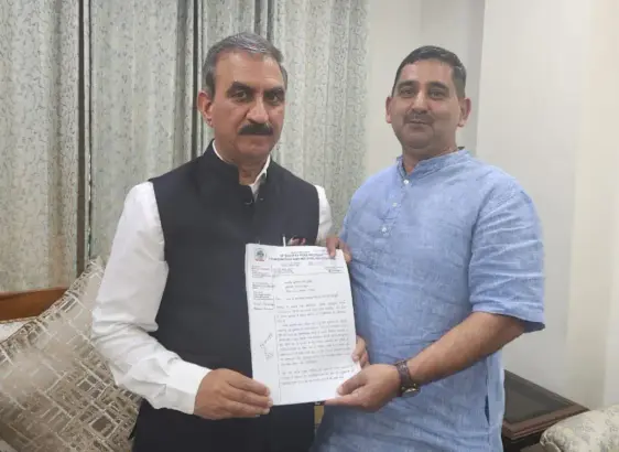 Deputy Chief Whip Kewal Singh Pathania handing over the request memorandum to Chief Minister Thakur Sukhvinder Singh Sukhu.