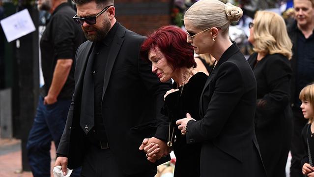 BIRMINGHAM, ENGLAND - JULY 30: (L-R) Jack Osbourne, Sharon Osbourne and Kelly Osbourne arrive to view tributes to the late Ozzy Osbourne from fans as his funeral cortege travels through his home city of Birmingham on July 30, 2025 in Birmingham, England. The Black Sabbath frontman passed away on July 22nd at the age of 76. His death occurred just a little over two weeks after his final live performance at the 'Back to the Beginning' concert in his hometown of Birmingham. (Photo by Leon Neal/Getty Images)