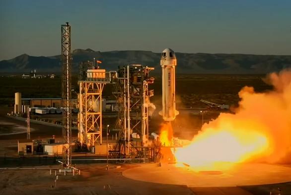 Blue Origin New Shepard rocket ship lifts off
