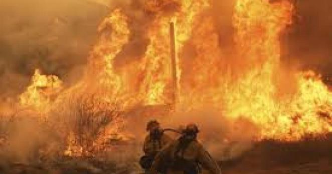Firefighters battling the Canyon Fire Thursday.