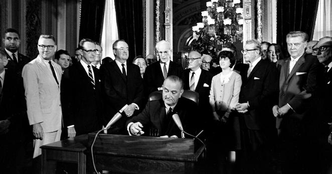 President Lyndon B. Johnson signing the Voting Rights Act of 1965 in a ceremony in the President’s Room at the Capitol.