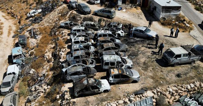 Burned out cars in Burqa, in the West Bank, last month.