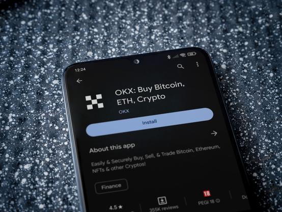 OKX trading app on a mobile phone (CoinDesk)