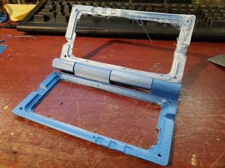 2 of the bottom parts of the folding pinephone case showing how the hinge fits together.