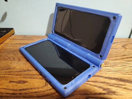 Open view of the folding dual pinephone case