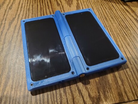 Open flat front of the folding dual pinephone case