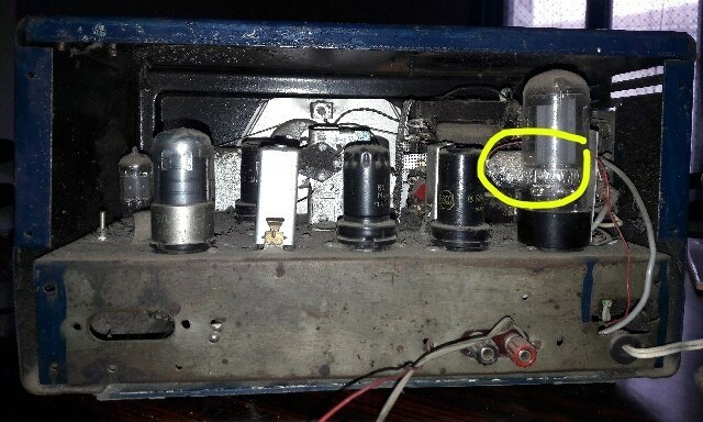 Dusty interior of an old Hallicrafters S-38 salvaged from junk,  showing a preamp mod with an aluminum foil shielded ECC-83 triode-pentode tube.
Done circa late '70s.