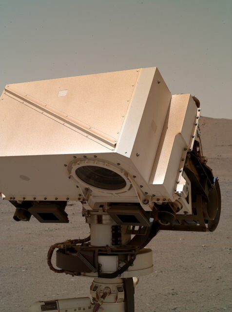 Perseverance's masthead with all its NAVCAM and Mastcam-Z eyes and the cyclopean single SuperCam telescope at its forehead looking down, possibly at the sample tube #9 it had dropped earlier. It resembles a robot's head in a SciFi movie, pondering about its life so far and what comes next.