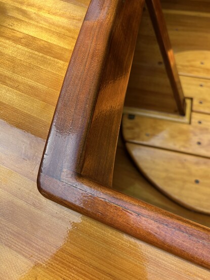 Close up of mahogany trim around the cockpit coming. 