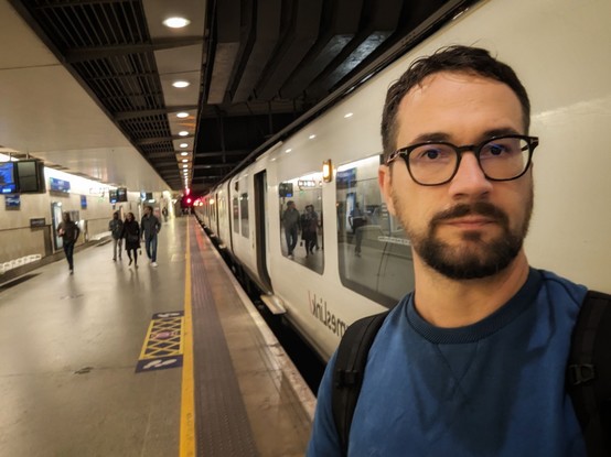 Man with an approaching train
