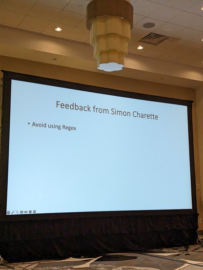 A slide titled "feedback from Simon Charette" with a single bullet: avoid using regex