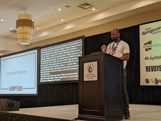 Felipe next to a slide with text "ancestral odyssey"