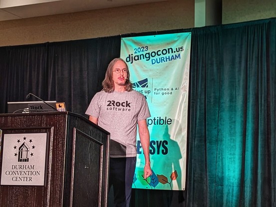 Peter on the DjangoCon US 2023 stage