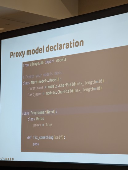 A slide declaring a Django model named nerd and a proxy model named programmer that inherits from the base nerd class