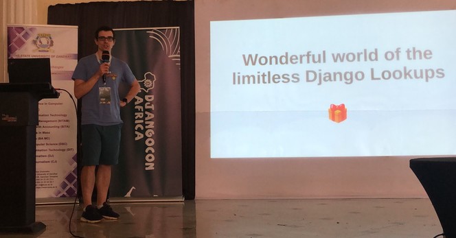 Me on the DjangoCon Africa stage giving a talk on lookups