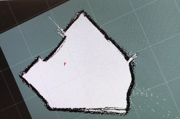 RVIZ2 screenshot showing map computed by slam toolbox from lidar scans, and a pose marker denoting the robot's position and heading.

The computed map polygon is quite accurate to the physical room.