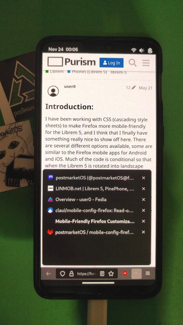 Photo of a OnePlus 6 with a work-in-progress version of mobile-config-firefox, without a tab bar and with more space for the urlbar