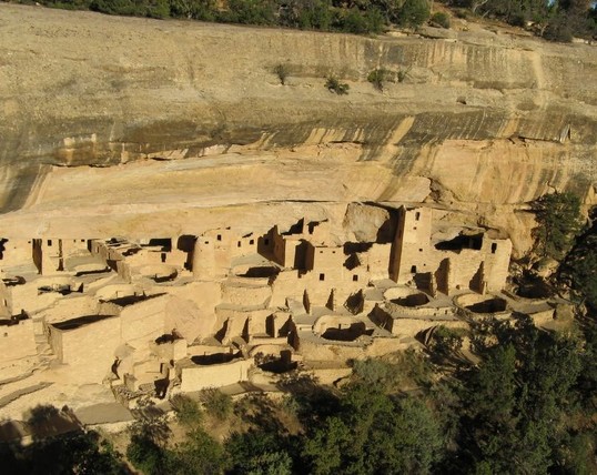 Photo of the cliff palace (sandstone buildings built in the 1190s under a natural cliff overhang) at Mesa Verde National Park, USA.
