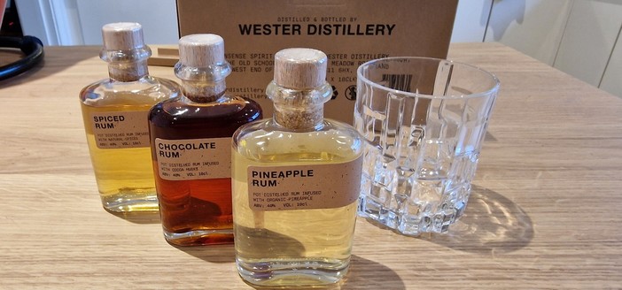3 small 10cl bottles of rum from Wester distillery. Pineapple rum, chocolate rum, and spiced rum.