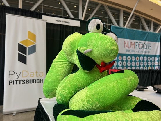 The PyData Pittsburgh booth in the Expo Hall at PyCon US 2024