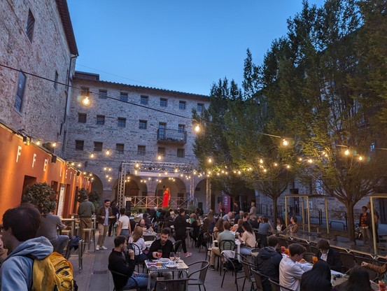 People sitting at tables outdoor 