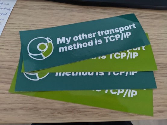 A bumper sticker that reads “My other transport method is TCP/IP” 