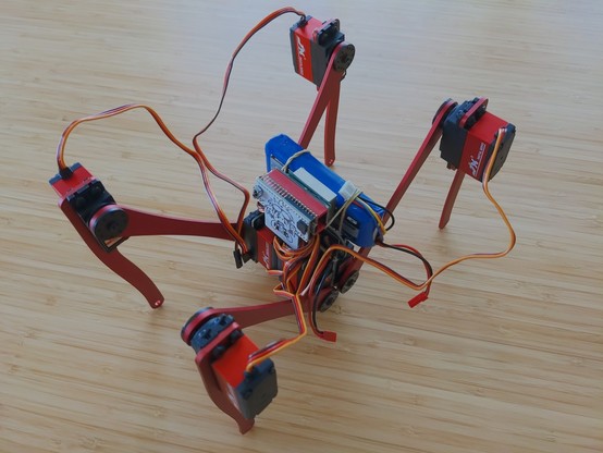 robot with the metal legs and a pcb body